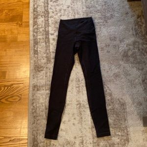 Lululemon black and grey striped leggings. Size 4. 28 in long. Lightly used.